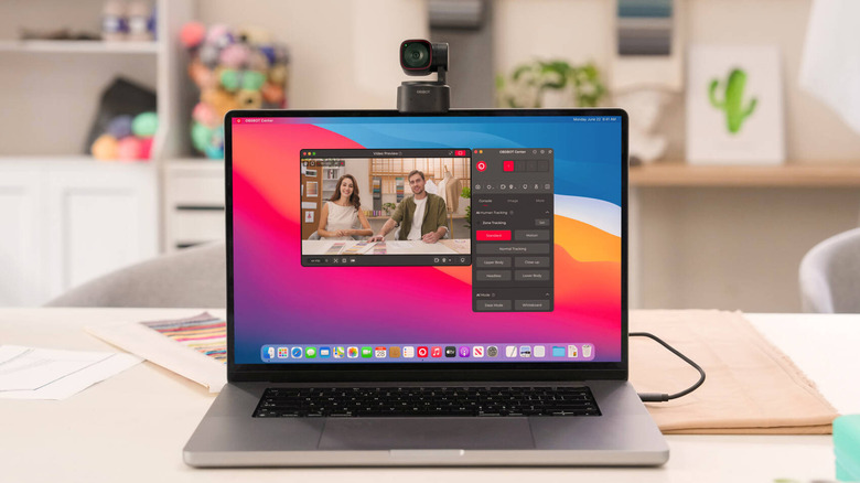 The OBSBOT Tiny 2 Lite webcam attached to the top of a laptop.