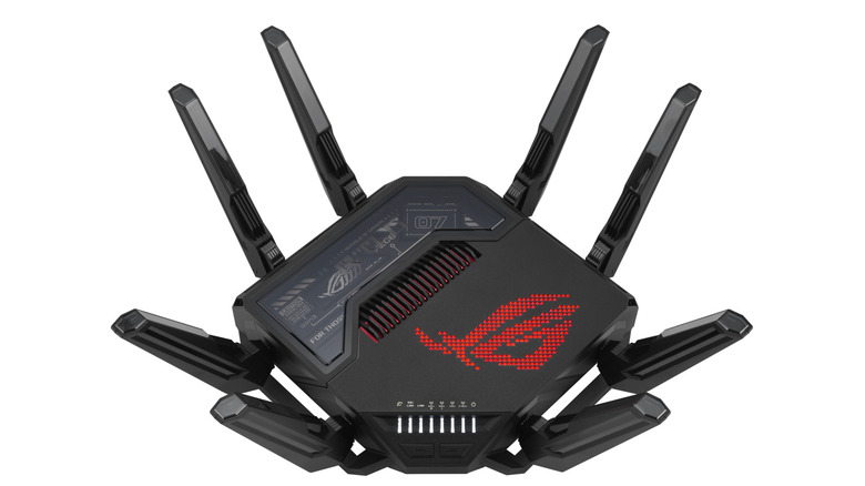 A black gaming router with red graphics and eight antennae on a white background.