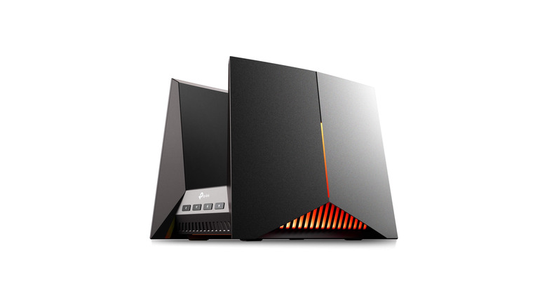 A black gaming router with two large wing panels on each side in front of a white background.