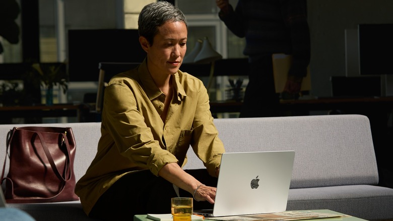 Apple MacBook Pro living room table laptop