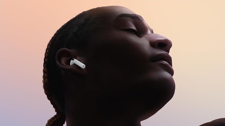 Woman wearing Apple AirPods.