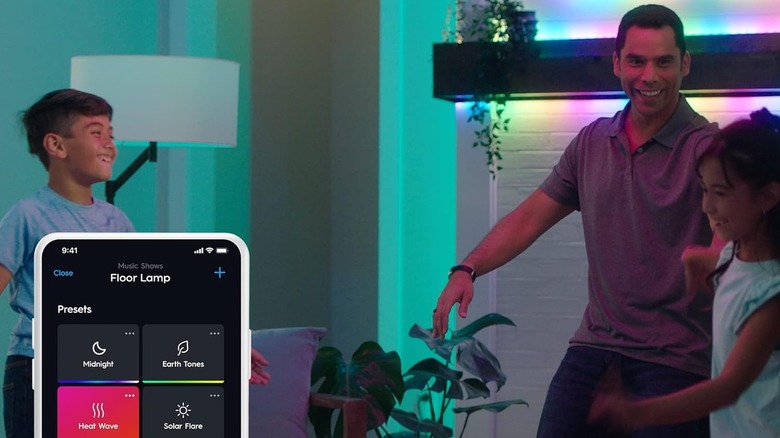Cync GE Dynamic Lights with the smartphone application adjusting the colors