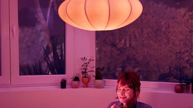 WiZ Connected Light above a person in their dining room
