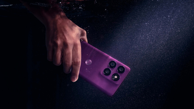 Holding the Motorola Edge 60 Pro underwater