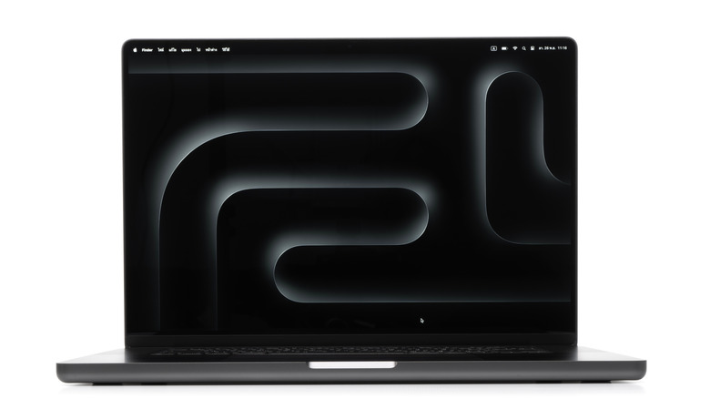 Macbook Pro open showing M3 wallpaper