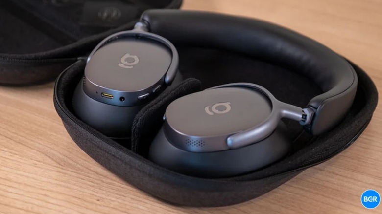 The Baseus Inspire XH1 wireless headphones resting in their carrying case