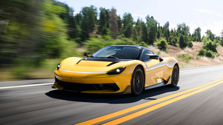 The Pininfarina Battista driving on a mountainous road