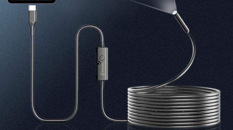The Ennovor Endoscope Camera with Light on a dark background