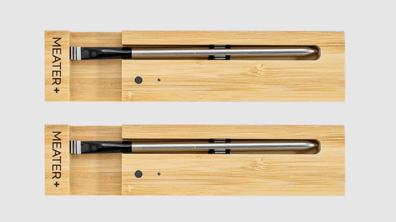 Two MEATER Plus thermometers in wooden cases
