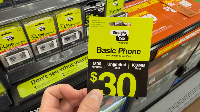 A Straight Talk SIM card on display inside a Walmart store