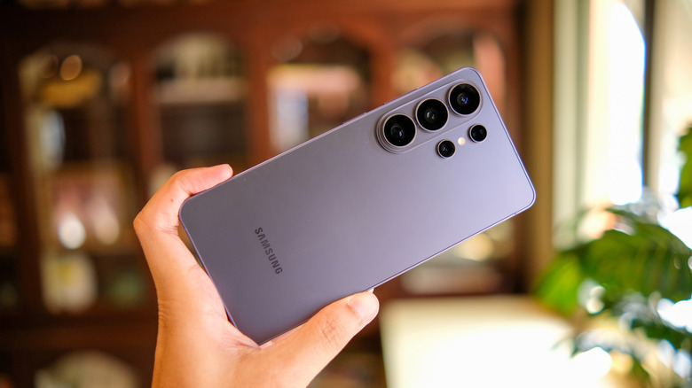 A person holding the Samsung Galaxy S26 Ultra