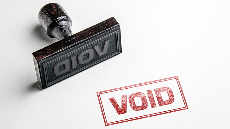 A stamp next to the word VOID in red ink.