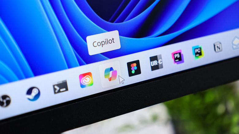 The Windows taskbar with Microsoft Copilot highlighted.