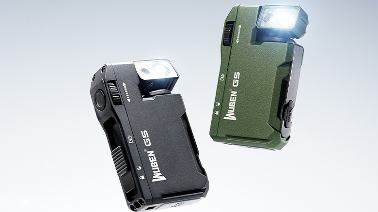 A pair of Wuben G5 EDC flashlights with their lights turned on.