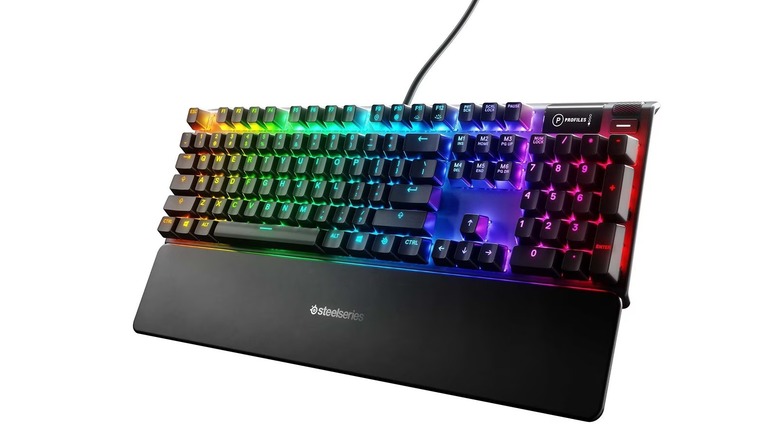 The SteelSeries Apex 7 gaming keyboard with its RGB lights activated, on a white background.