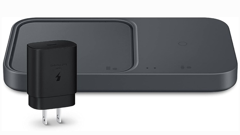 The charger 2 duo pad next to a Samsung charging brick