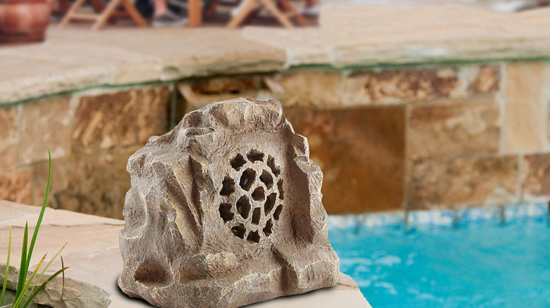 Rock bluetooth speakers in outdoor setting