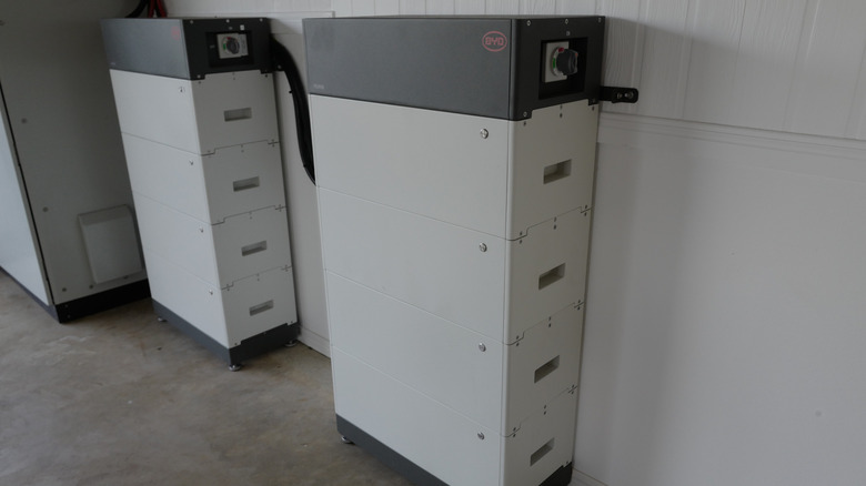 Two lithium battery stacks against a wall