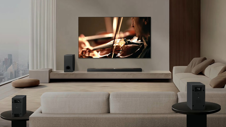 LG S90TR soundbar system shot from the back of the living room