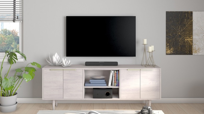 Yamaha SR-C30A soundbar and subwoofer installed on a TV table