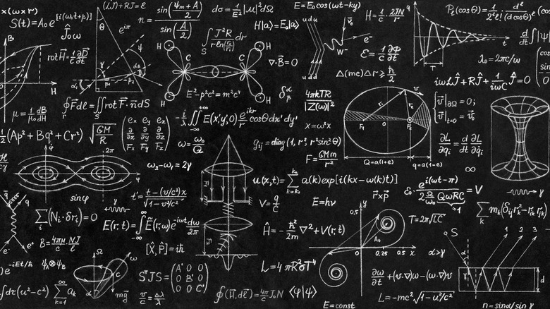A blackboard full of complex equations.