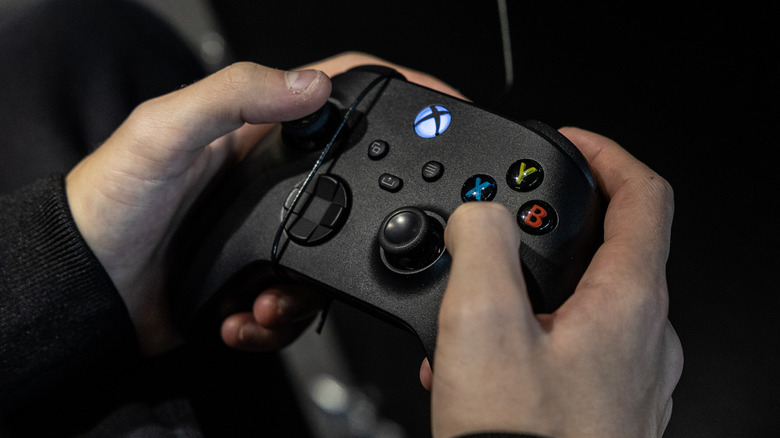 A person holding a controller