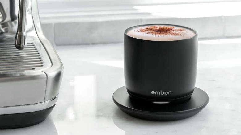 Ember mug sitting beside a coffee maker