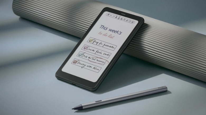 The Boox Palma 2 showing a to do list screen with the stylus next to the e-reader.