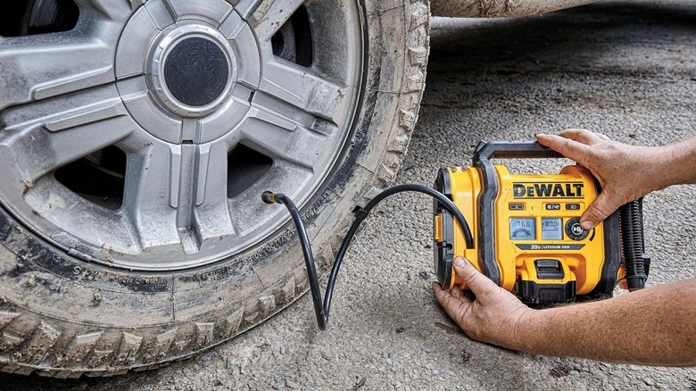 Inflating a tire with DeWalt tire inflator
