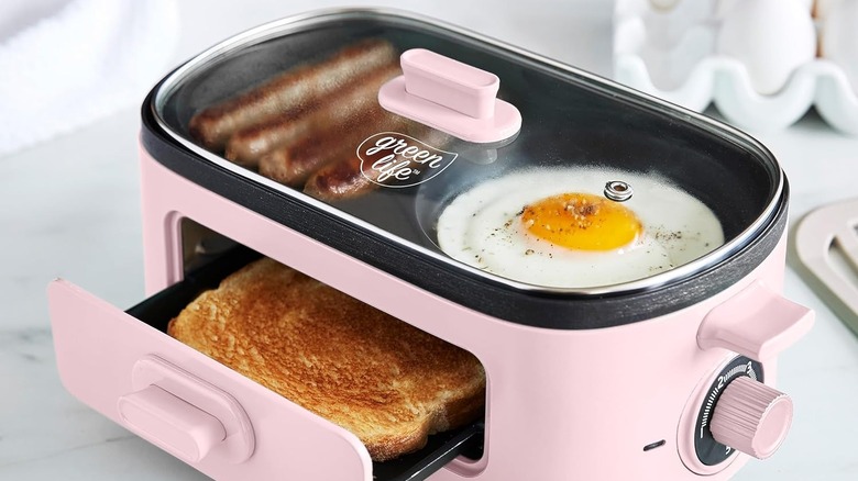 GreenLife 3-in-1 Breakfast Maker Station with sasuages, eggs, and toast inside the device