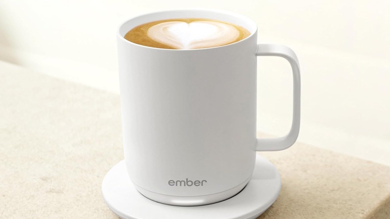 White Ember Smart Mug 2 filled with coffee sitting on the charger