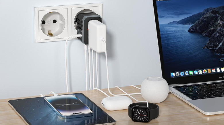The Epicka Universal Travel Adapter charging six devices.