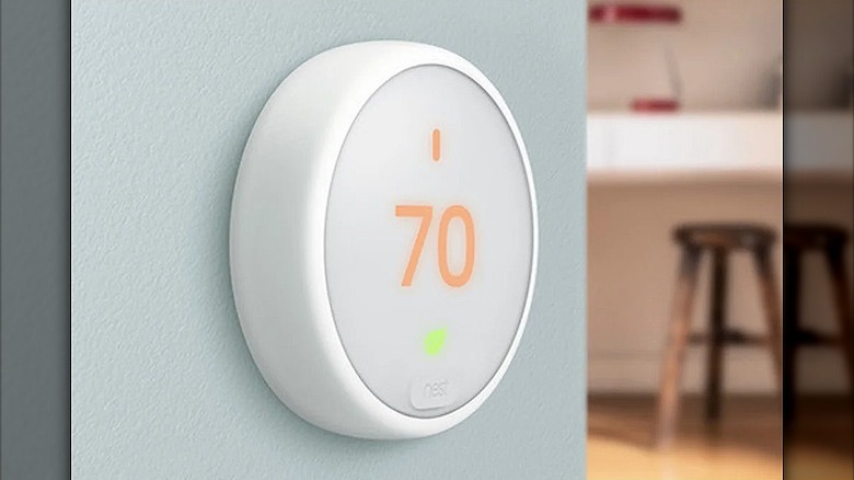 Google thermostat showing 70-degree temperature