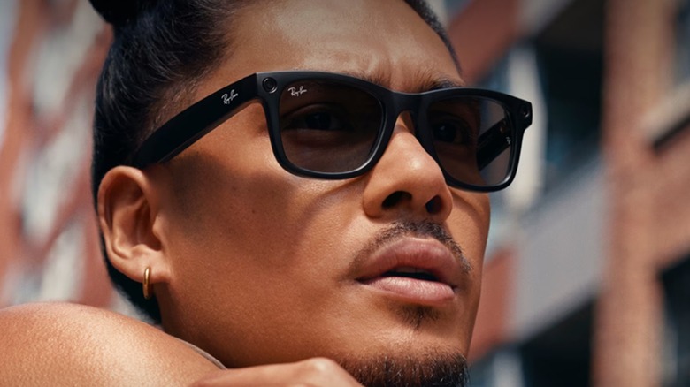 A man wearing the Ray-Ban Meta (Gen 1) smart glasses.
