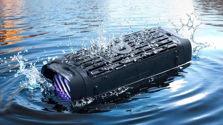 The Soundcore Boom 3i floating in a lake.