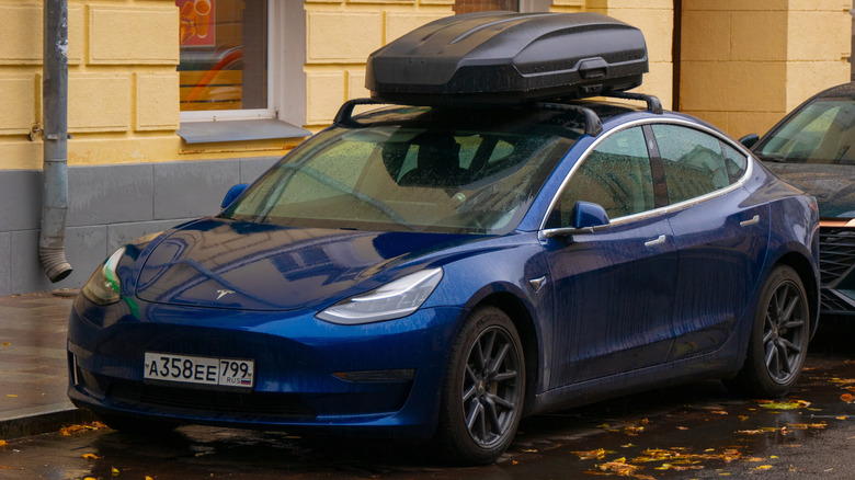Image of a Tesla with a roof rack installed