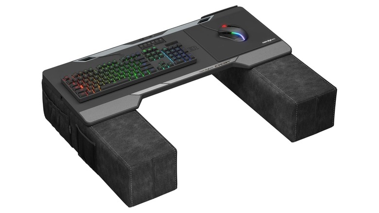 A high-end lapboard with a gaming keyboard and mouse isolated on a white background.