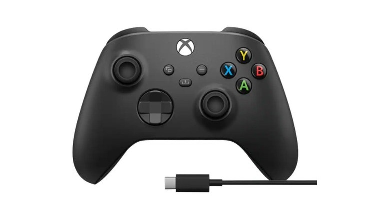 Xbox Wireless Controller front showing its buttons and a USB-C cable next to it