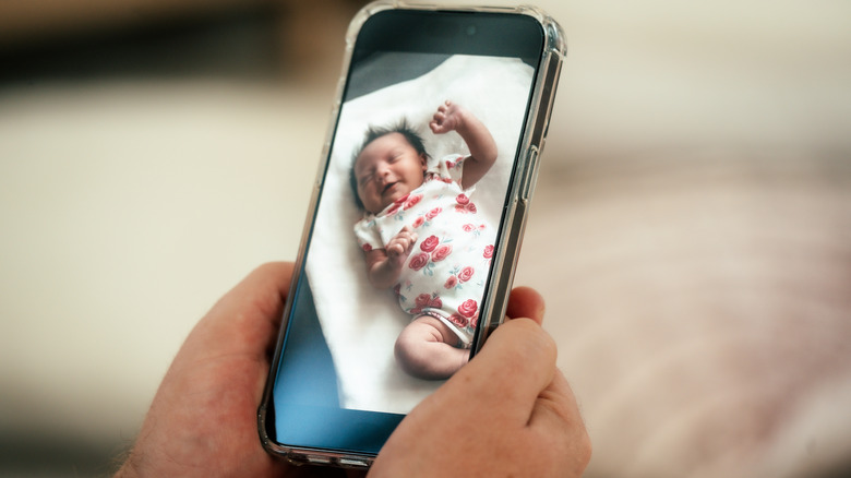 Keeping an eye on a baby on a smartphone