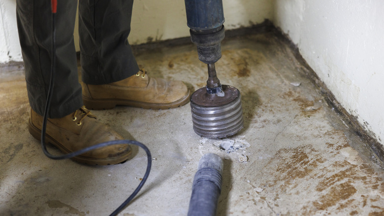 Radon mitigation system installer at home