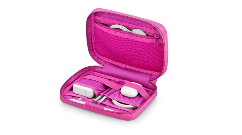 Herschel's pink organizer with chargers and cables stored inside of it