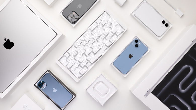 Different Apple accessories and devices on a table