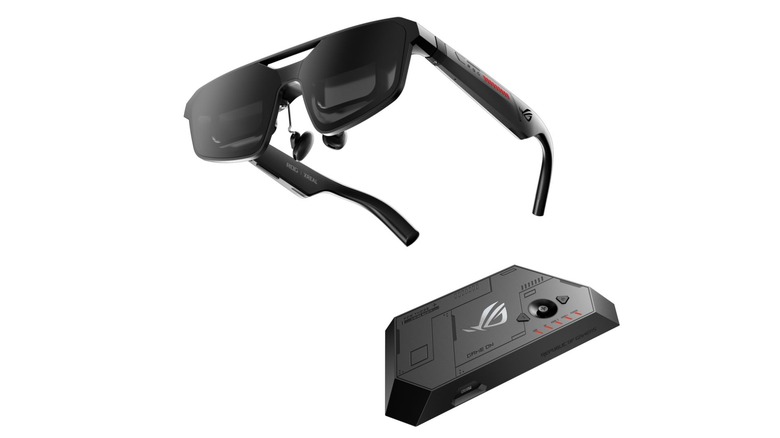 The R1 gaming glasses with its docking station in black