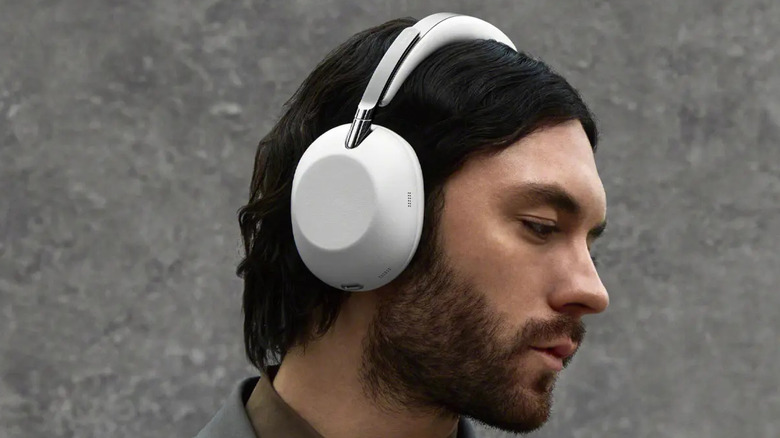 Man wearing a white pair of Sony headphones