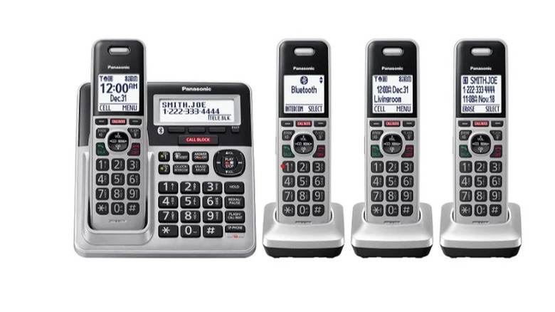 Four handsets in their slots and answering machine