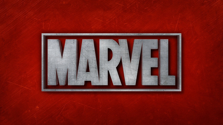 The Marvel logo in metallic grey against a red background