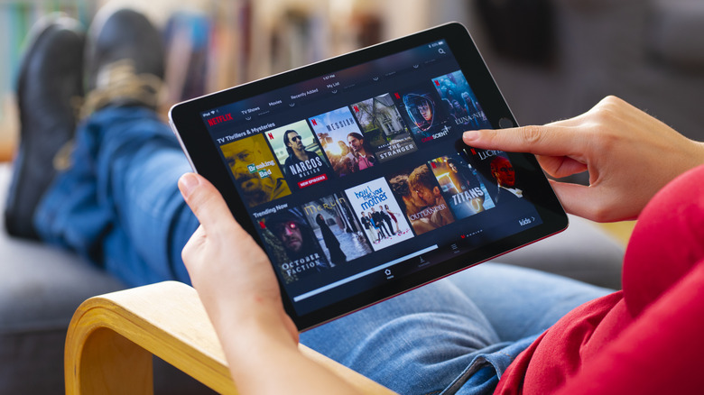 Browsing Netflix on a tablet