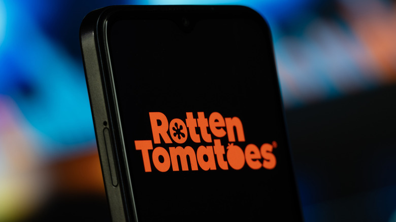 The Rotten Tomatoes logo on a smartphone