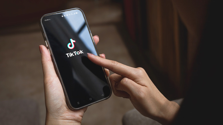 The TikTok logo on a smartphone