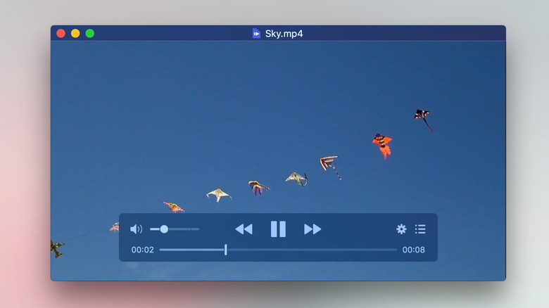 IINA Mac app playing a video with native interface in dark mode.